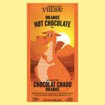 Chocolat chaud blanc à saveur d'orange avec un dragon de gourmet du village